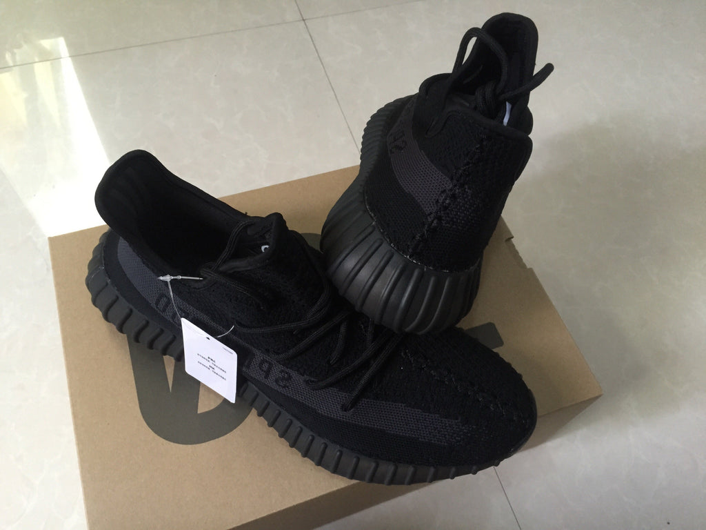 Adidas Yeezy Boost 350 V2 Sneakers in Black Knit - product image from the listing.