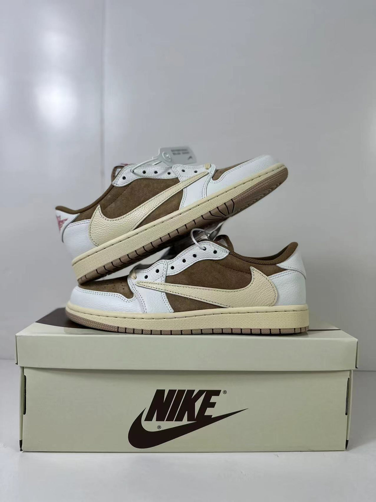 Travis Scott x Air Jordan 1 Low Reverse in Mocha Pink DM7866-106 - product image from the listing.