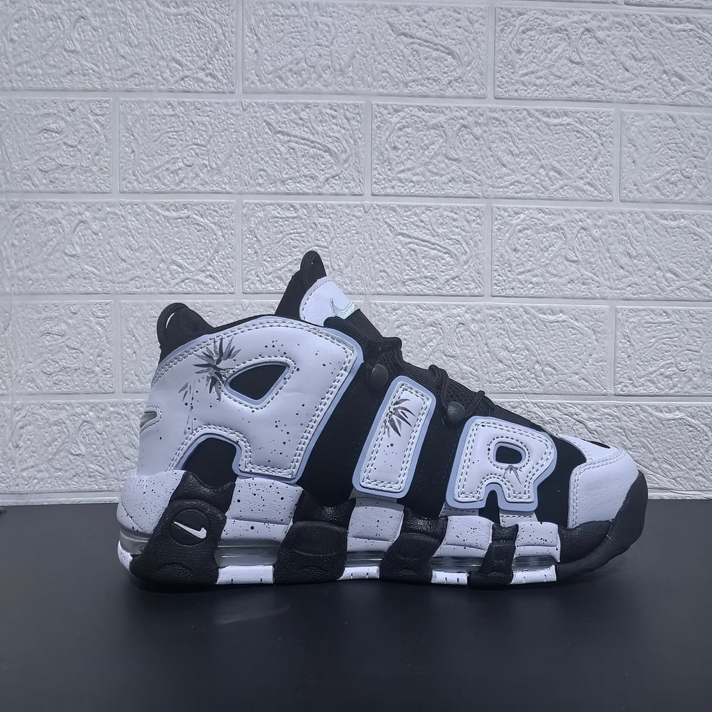Nike Air More Uptempo Panda Sneakers in Black and White - product image from the listing.
