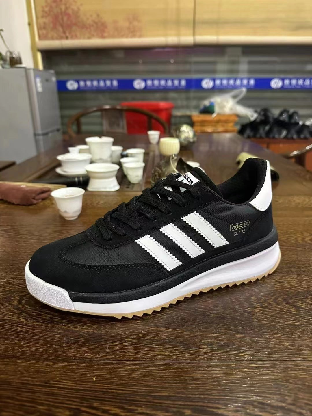 adidas SL 72 Sneakers in Black and White - product image from the listing.