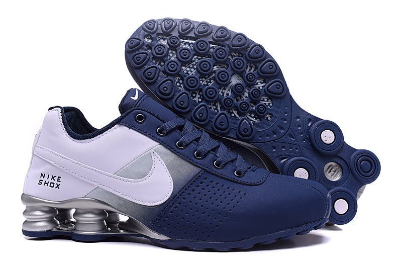 Nike Shox Deliver Trainers in Multiple Colorways - product image from the listing.