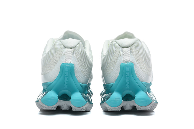 Nike Air Max Sneakers in White and Teal - product image from the listing.