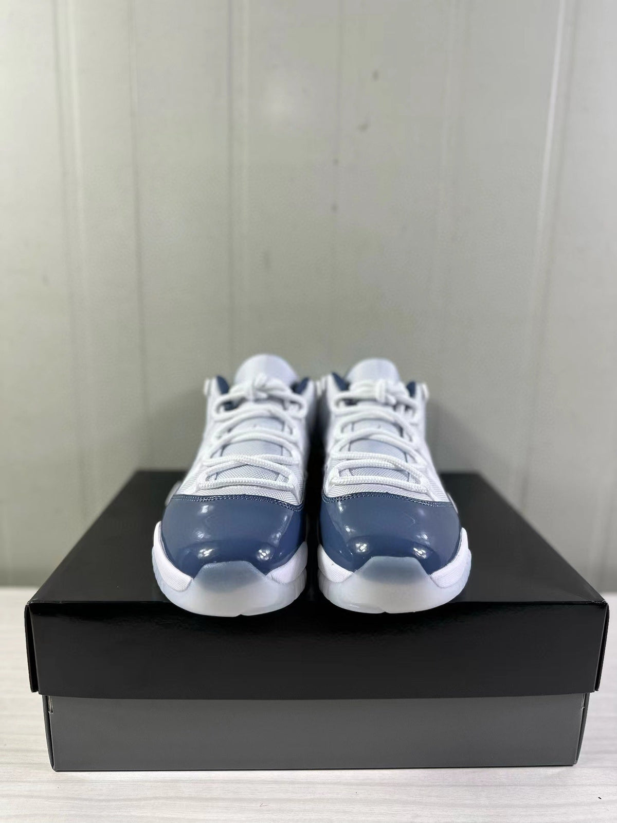 Air Jordan 11 Low Diffused Blue Sneakers FV5104-104 - product image from the listing.