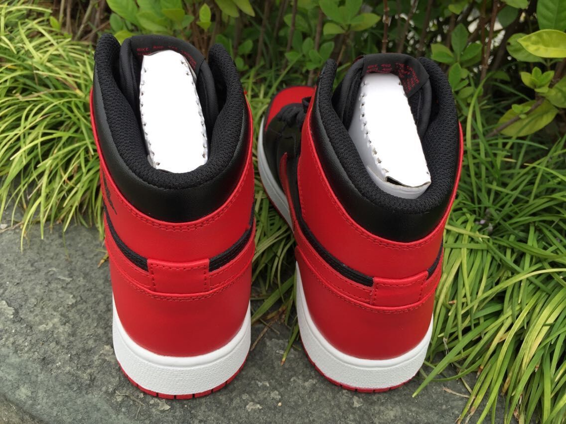 Air Jordan 1 High Sneakers in Black Red White - product image from the listing.