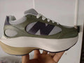 New Balance 9060 Olive Green Mesh Trainers - product image from the listing.