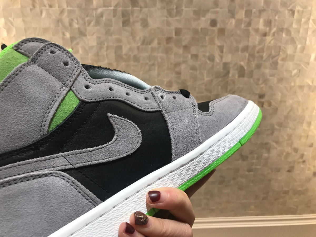Jordan 1 Retro High OG High-Top Sneakers in Grey Green - product image from the listing.