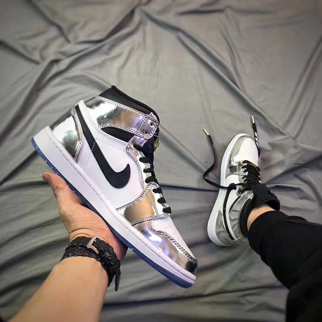Air Jordan 1 Pass The Torch High-Top Sneakers Silver White - product image from the listing.