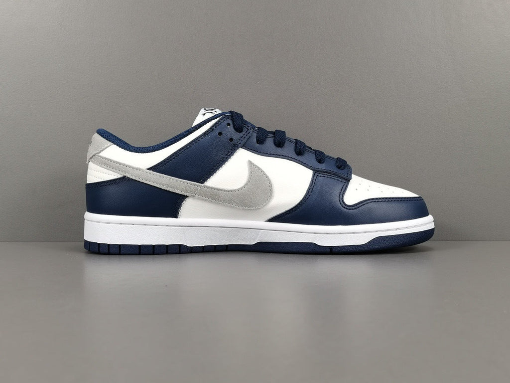 Nike Dunk Low Sneakers in Midnight Navy FD9749-400 - product image from the listing.