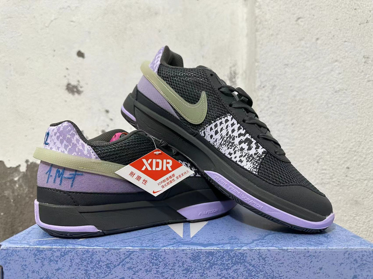 Nike Zoom GT Cut Academy Basketball Shoes in Black Purple - product image from the listing.