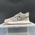 Nike Grey Snake-Print Low-Cut Sneakers - product image from the listing.