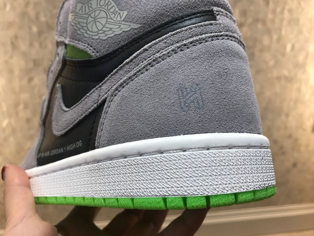 Jordan 1 Retro High OG High-Top Sneakers in Grey Green - product image from the listing.