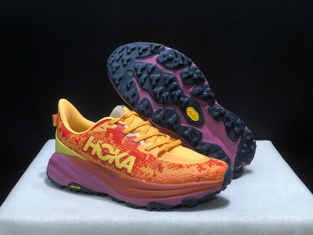 HOKA Speedgoat 6 Trail Running Shoes, in Orange and Yellow - product image from the listing.