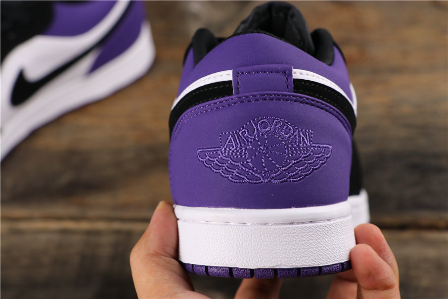 Jordan 1 Low in Black White Purple 553558-125 - product image from the listing.