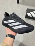 Adidas Lightstrike Pro Black Shoes for Running with White Stripes - product image from the listing.
