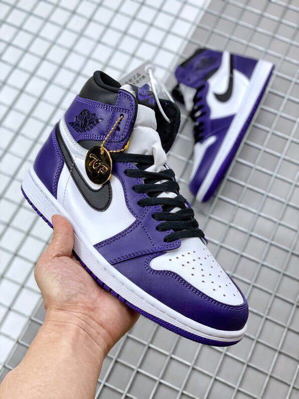 Air Jordan 1 High OG Court Sneakers in Purple 555088-500 - product image from the listing.