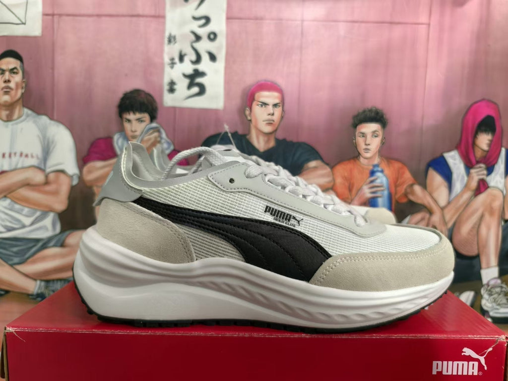 PUMA White and Black Running-Style Trainers - product image from the listing.