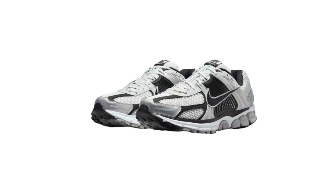 Nike Air Zoom Vomero 5 Running Shoes, in White and Black - product image from the listing.