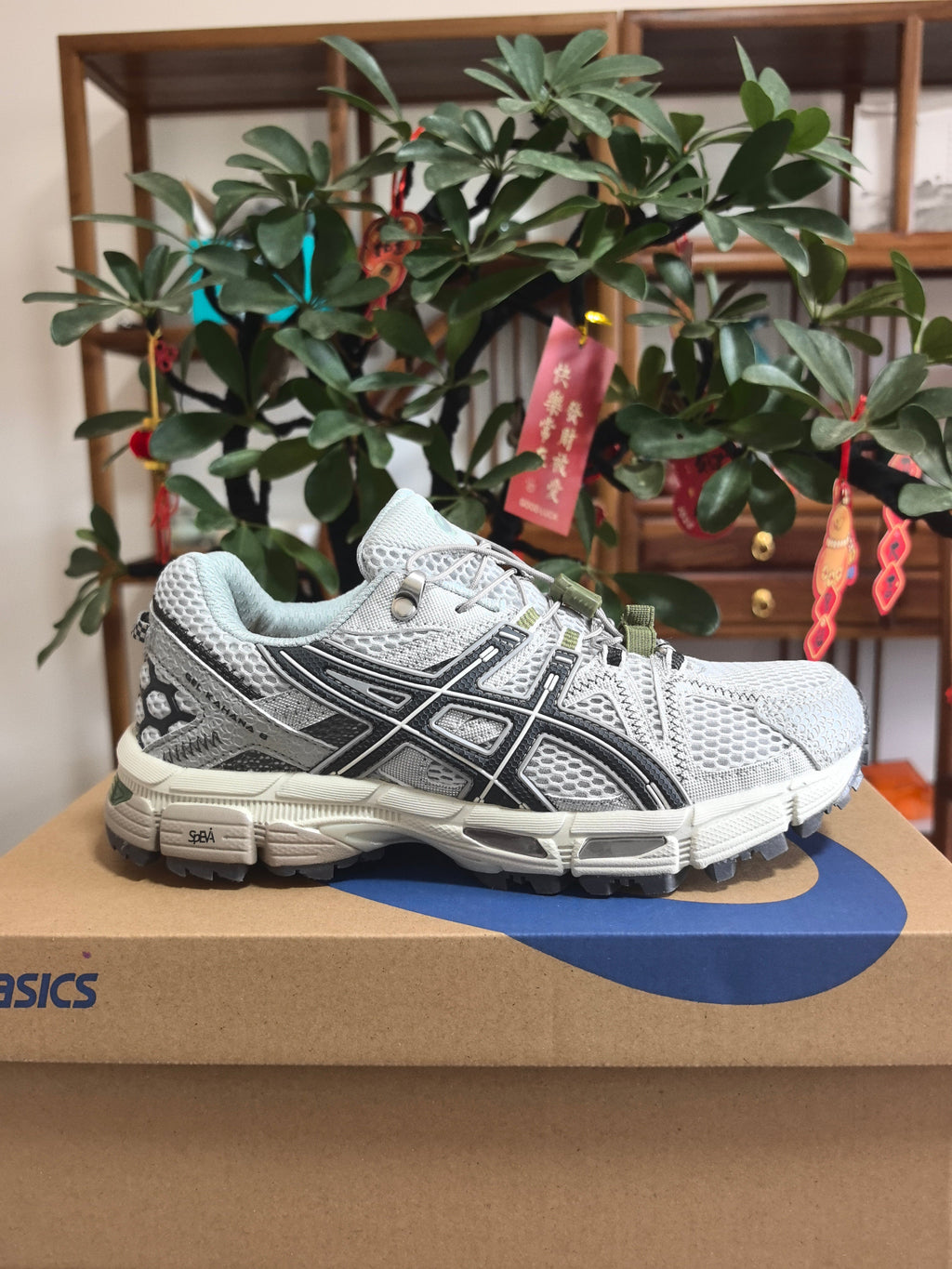 Nike Air Zoom Spiridon Cage 2 Sneakers, in Gray and White - product image from the listing.