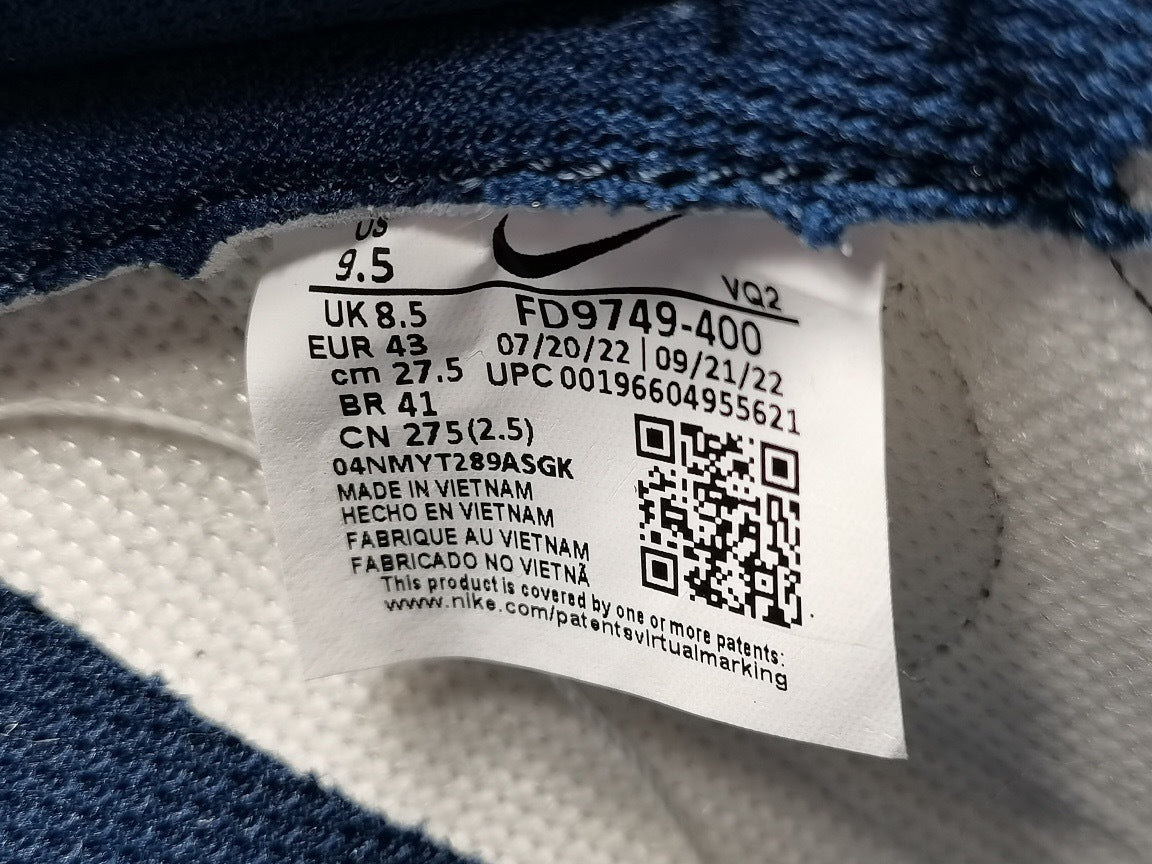 Nike Dunk Low Sneakers in Midnight Navy FD9749-400 - product image from the listing.