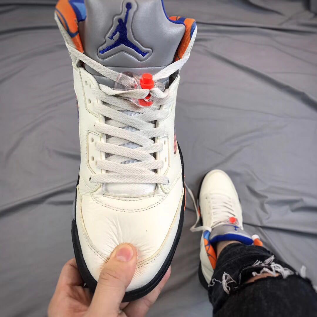 Air Jordan 5 International Flight White Orange Blue Sneakers - product image from the listing.
