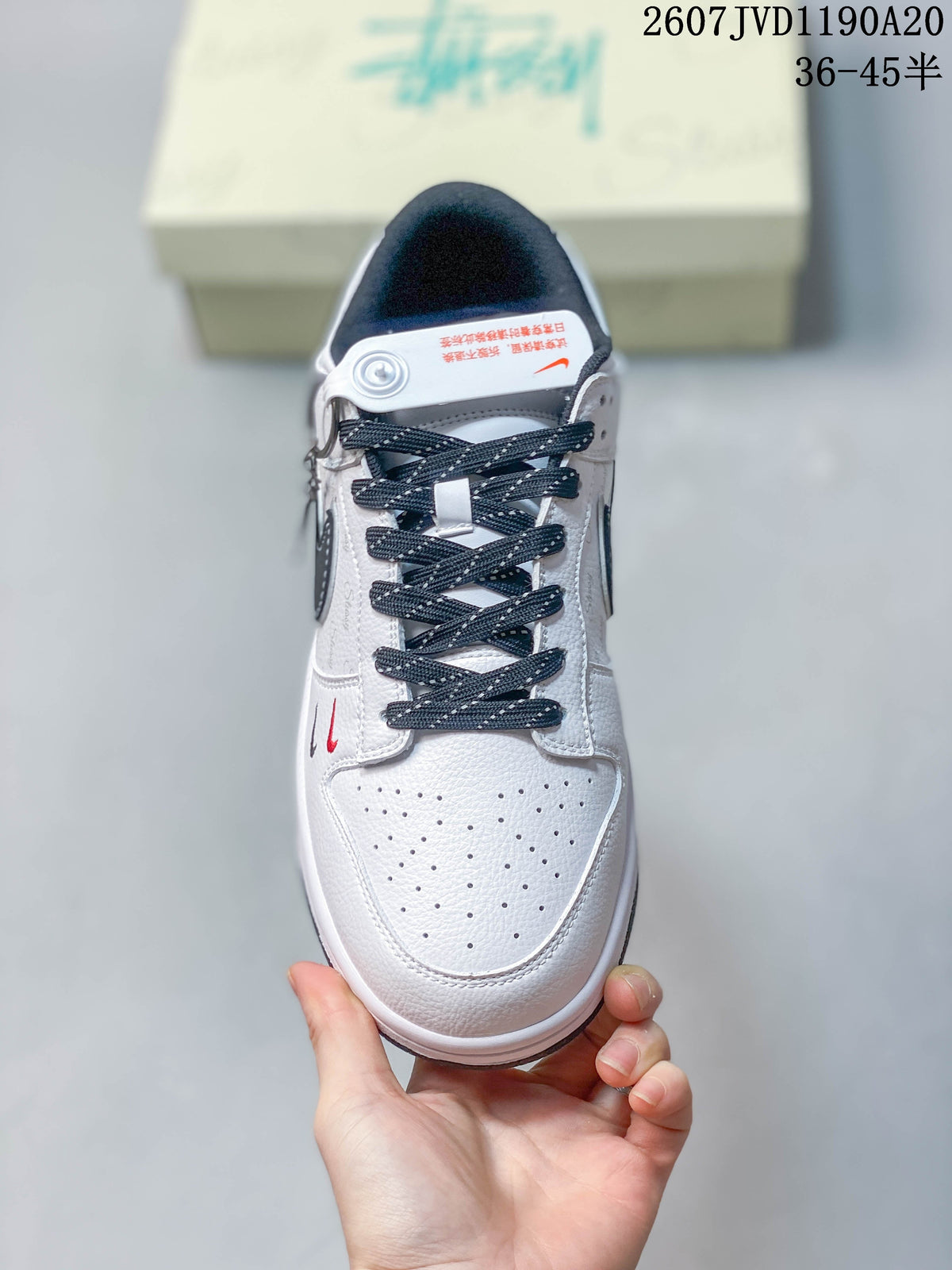 Nike SB Dunk Low Stüssy Sneakers in White Black - product image from the listing.