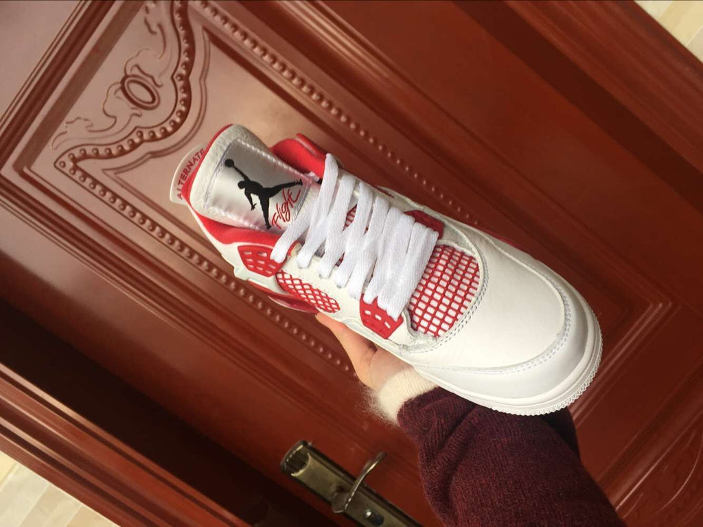 Jordan 4 Retro High-Top Sneakers in White and Red - product image from the listing.