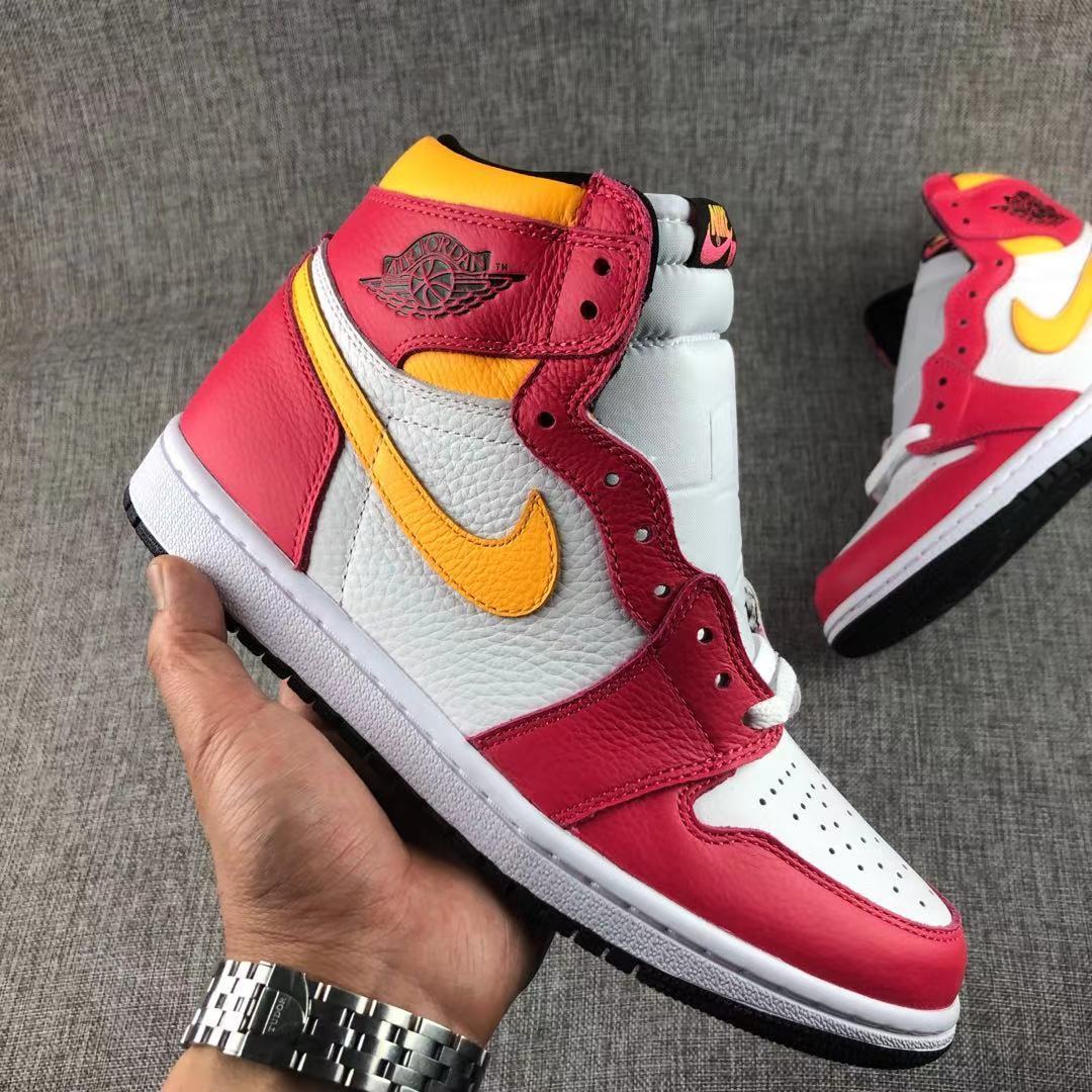 Air Jordan 1 High OG Light Fusion Red Sneakers 555088-603 - product image from the listing.