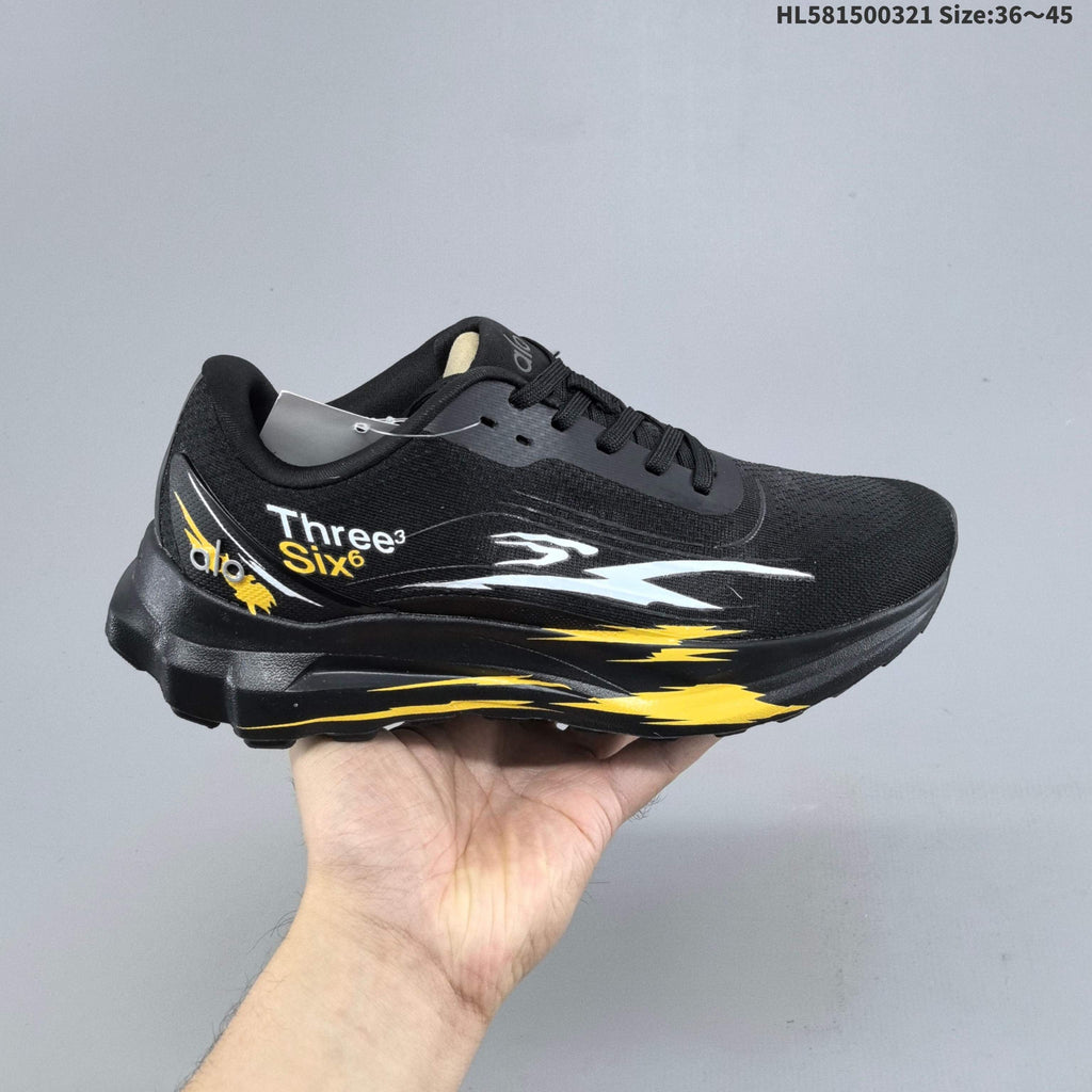 Alo Yoga Alo Runner Graphic Running Sneakers, in Black - product image from the listing.