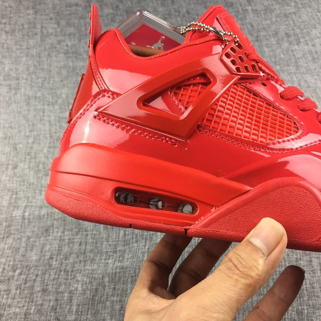 Air Jordan 4 Red Patent Leather Sneakers - product image from the listing.