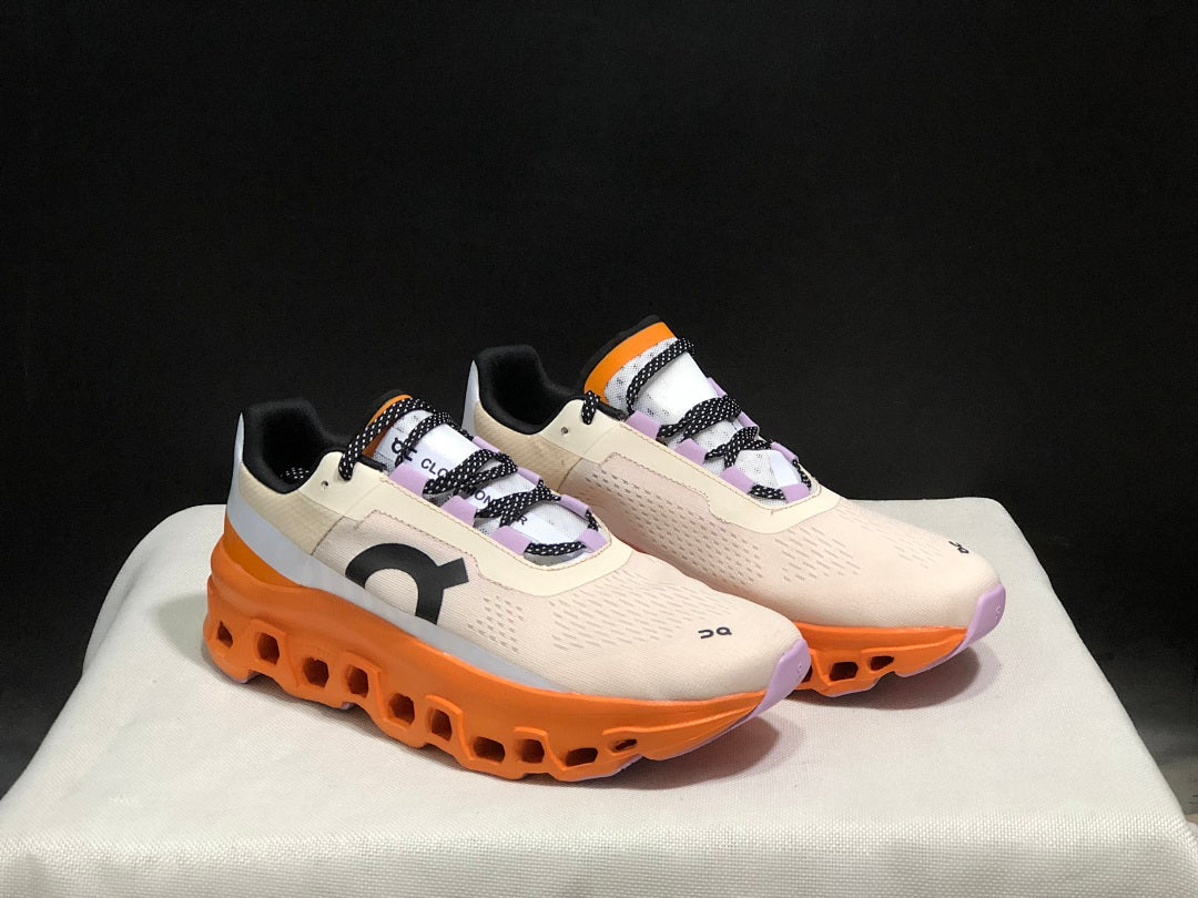 Yellow Tan and Orange On Cloudmonster Running Shoes - product image from the listing.