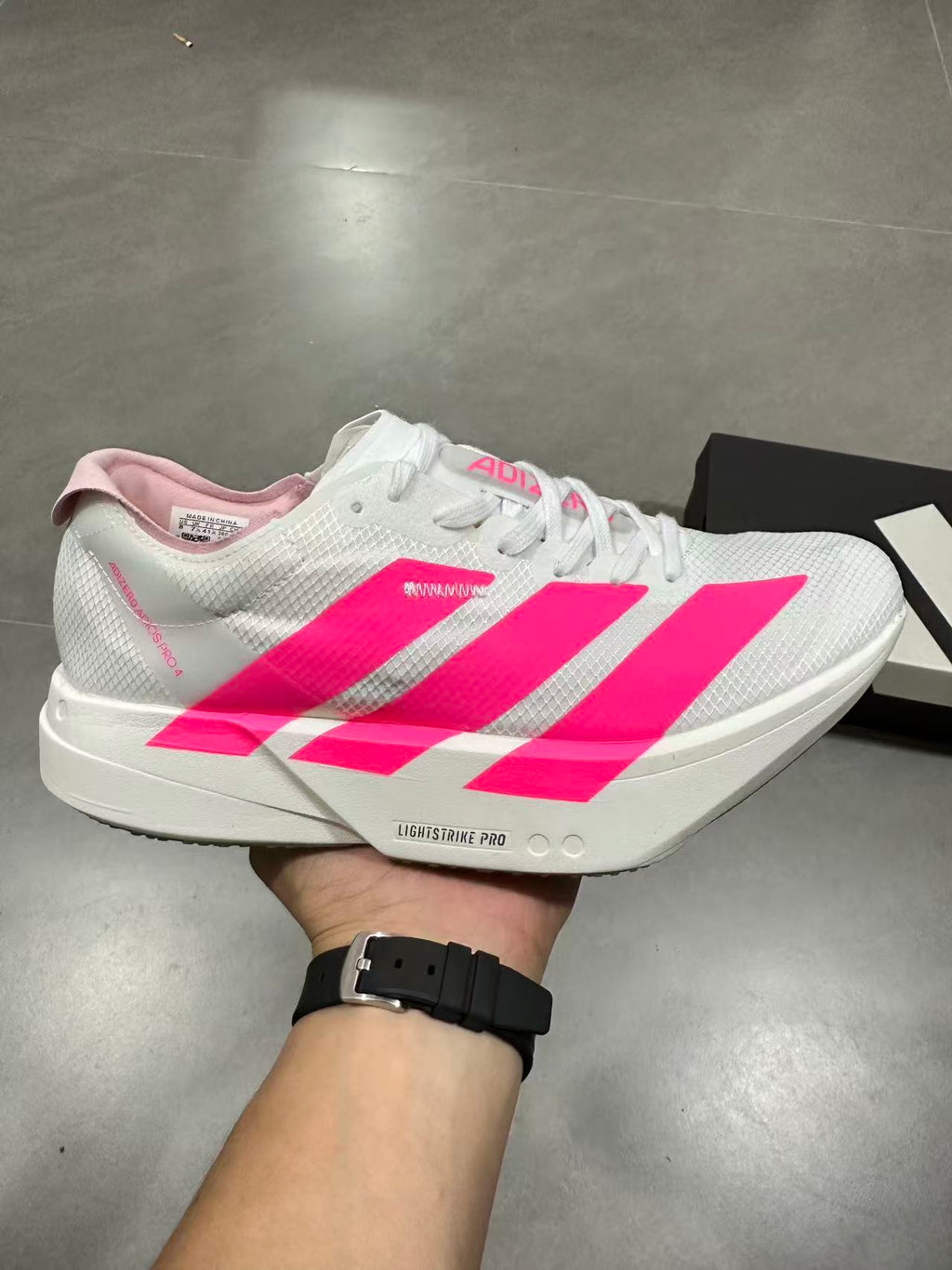 Nike Lightstrike Pro Running Shoes in White Pink - product image from the listing.