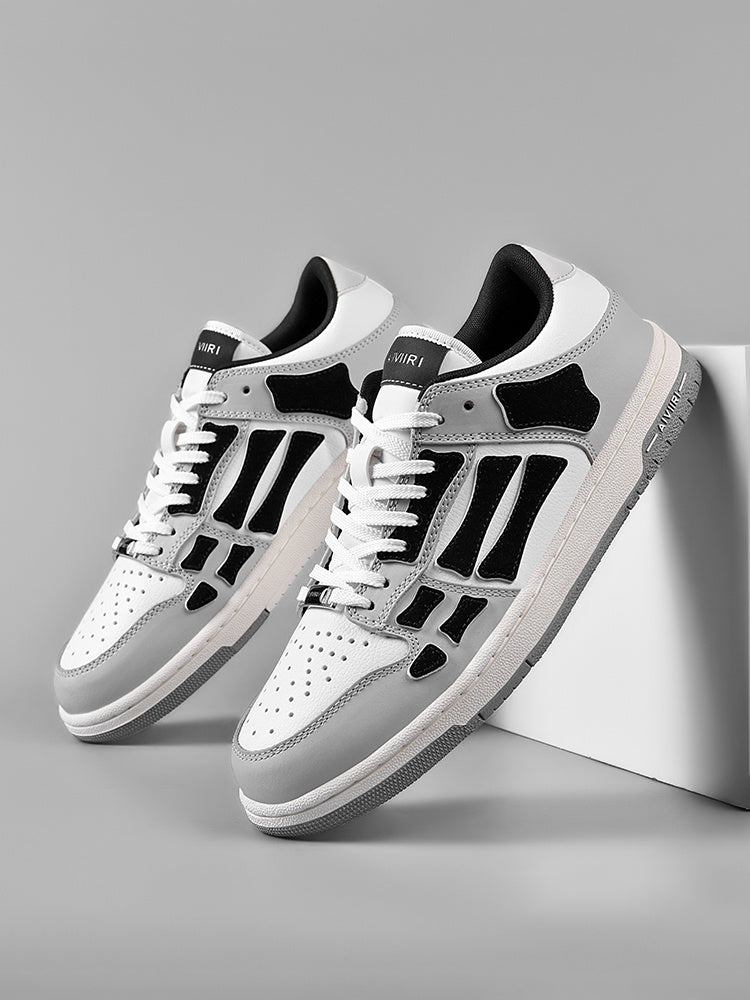 AMIRI Gray and White Low-Cut Sneakers with Black Accents - product image from the listing.