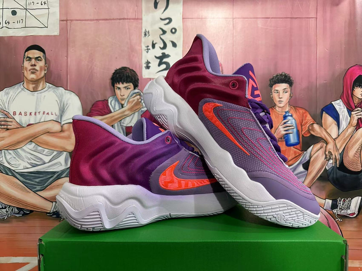 Purple and Burgundy Nike Basketball Shoes - product image from the listing.