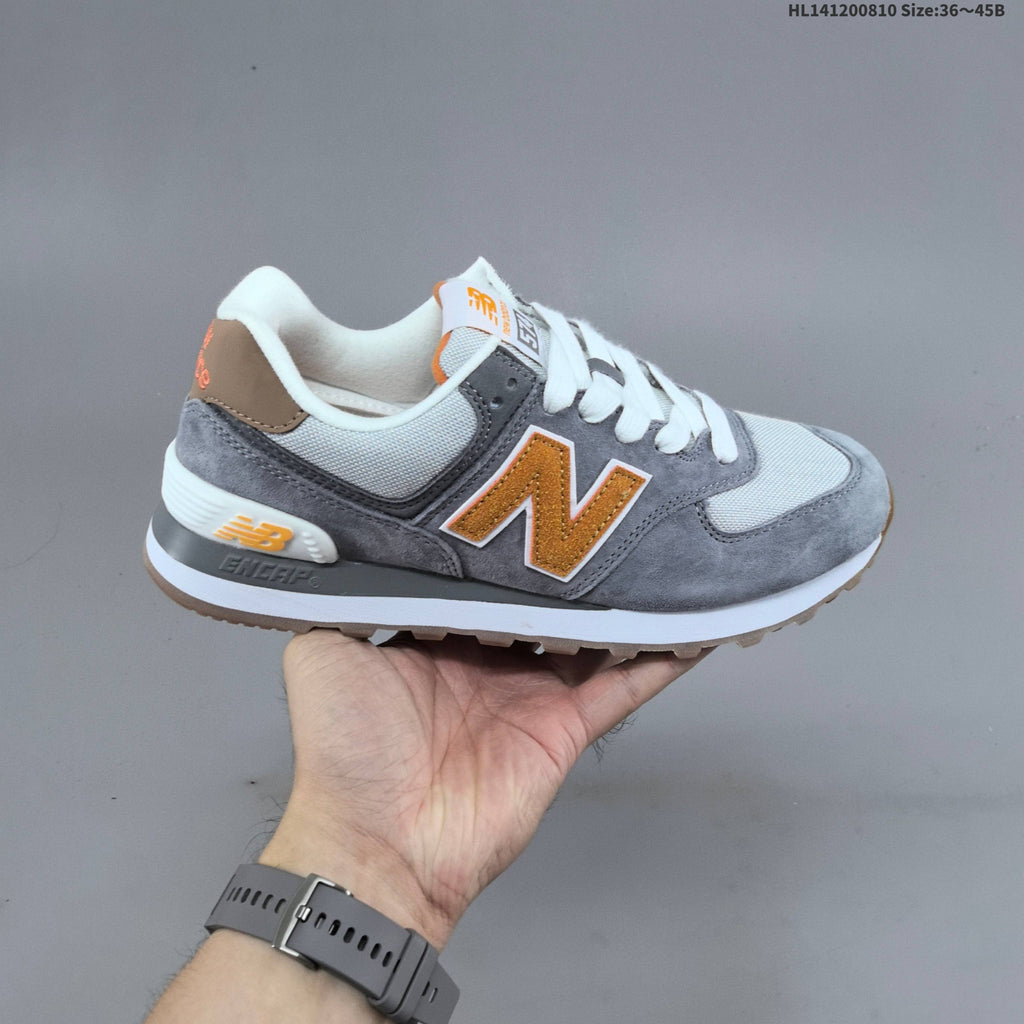 New Balance 574 Retro Sneakers in Black, Grey or in Cream - product image from the listing.