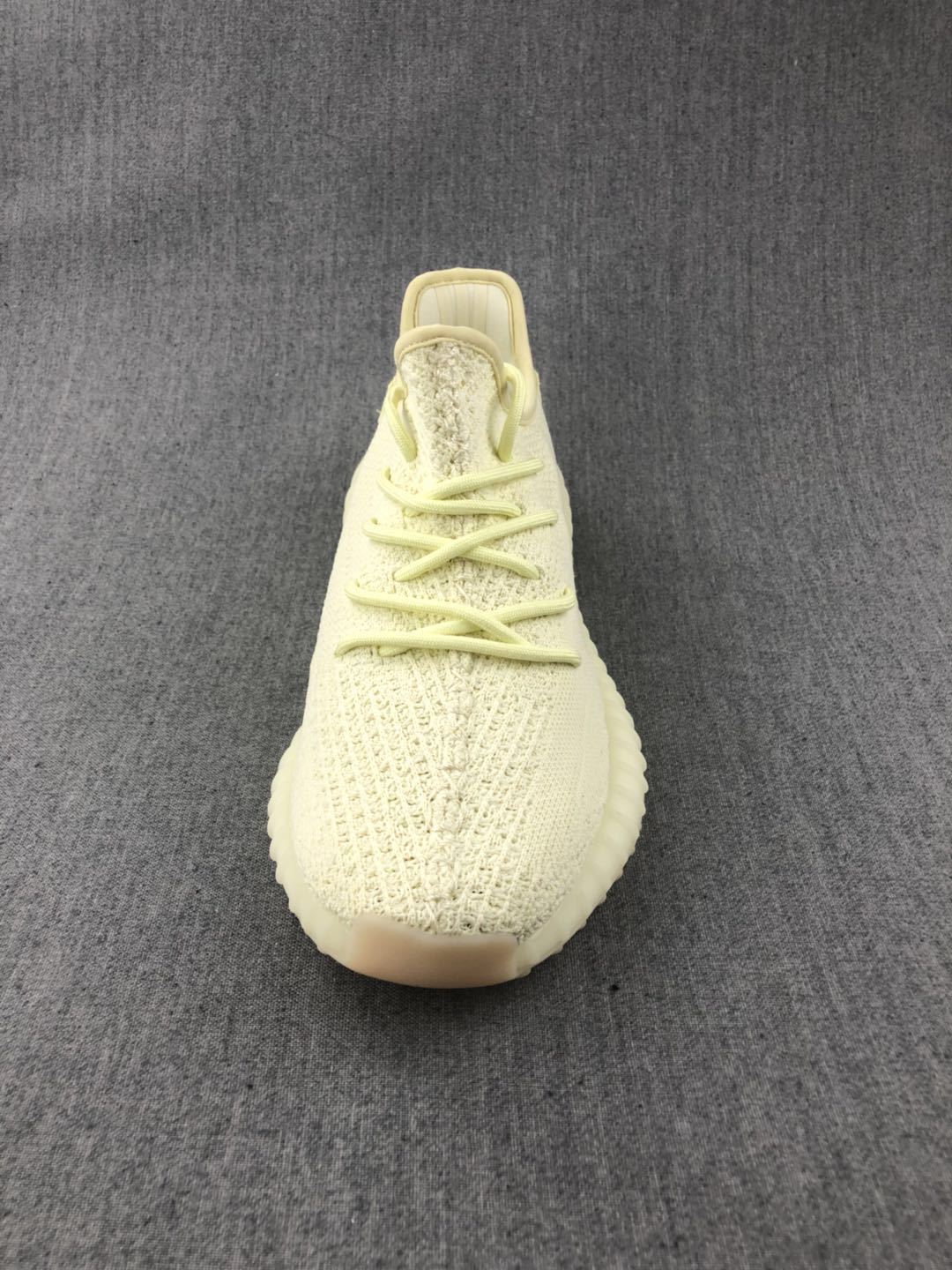 Cream Yeezy 350 V2 Knit Sneakers - product image from the listing.