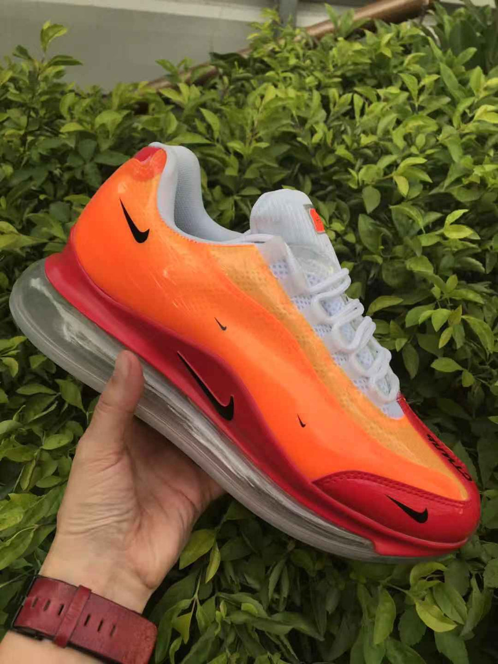 Orange and Red Nike Air Max 720 Sneakers - product image from the listing.