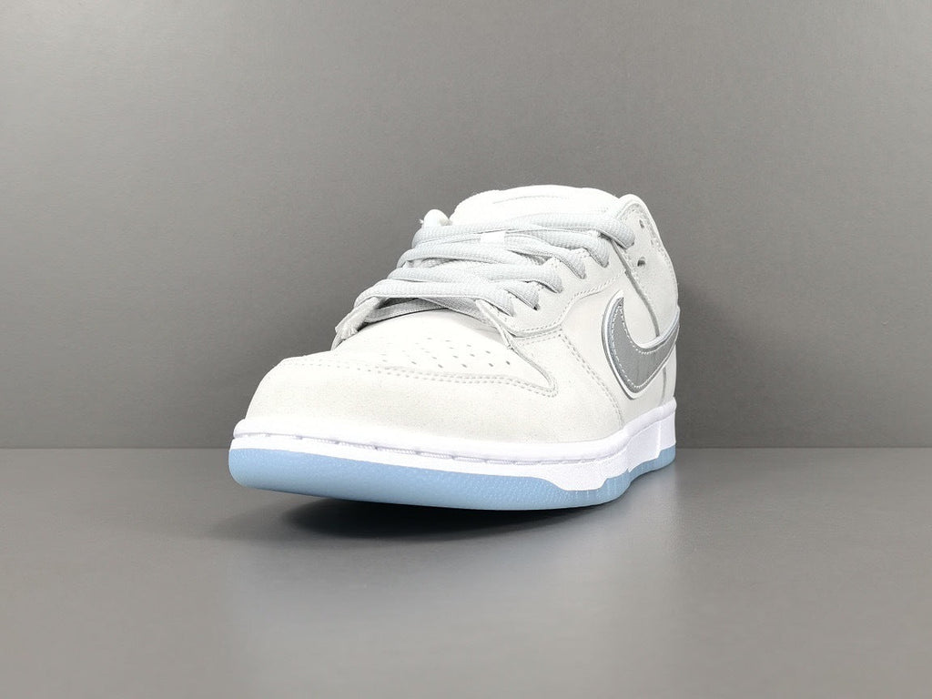 Nike Dunk Low SB Purple Lobster Sneakers in White FD8776-100 - product image from the listing.