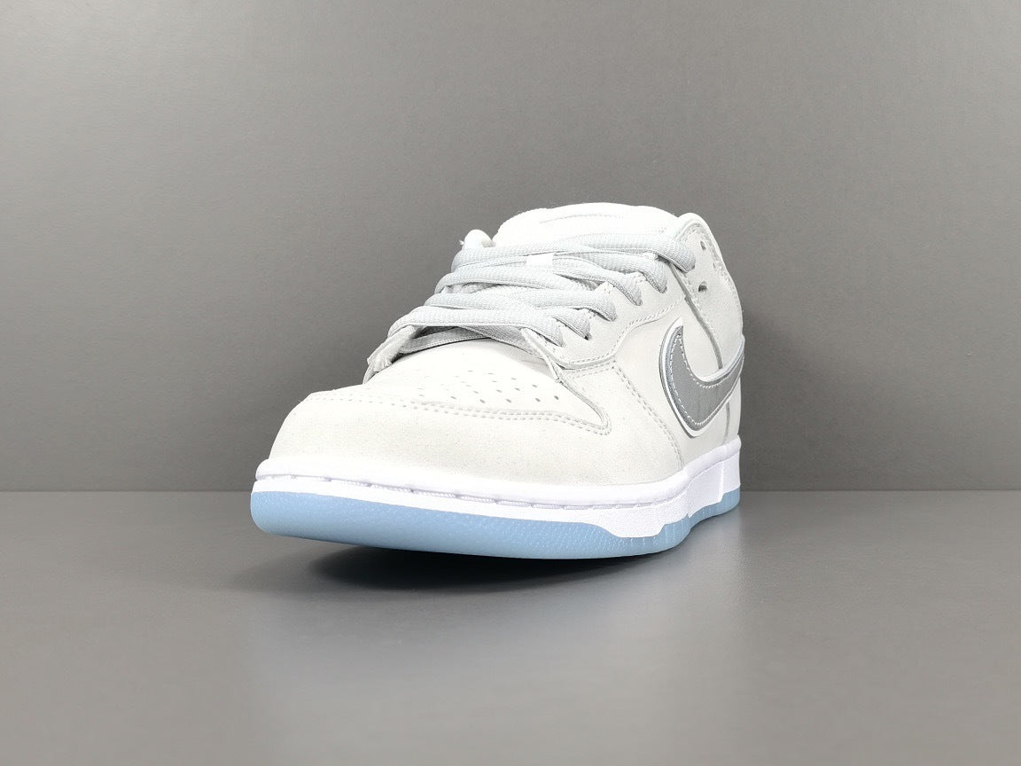 Nike Dunk Low SB Purple Lobster Sneakers in White FD8776-100 - product image from the listing.