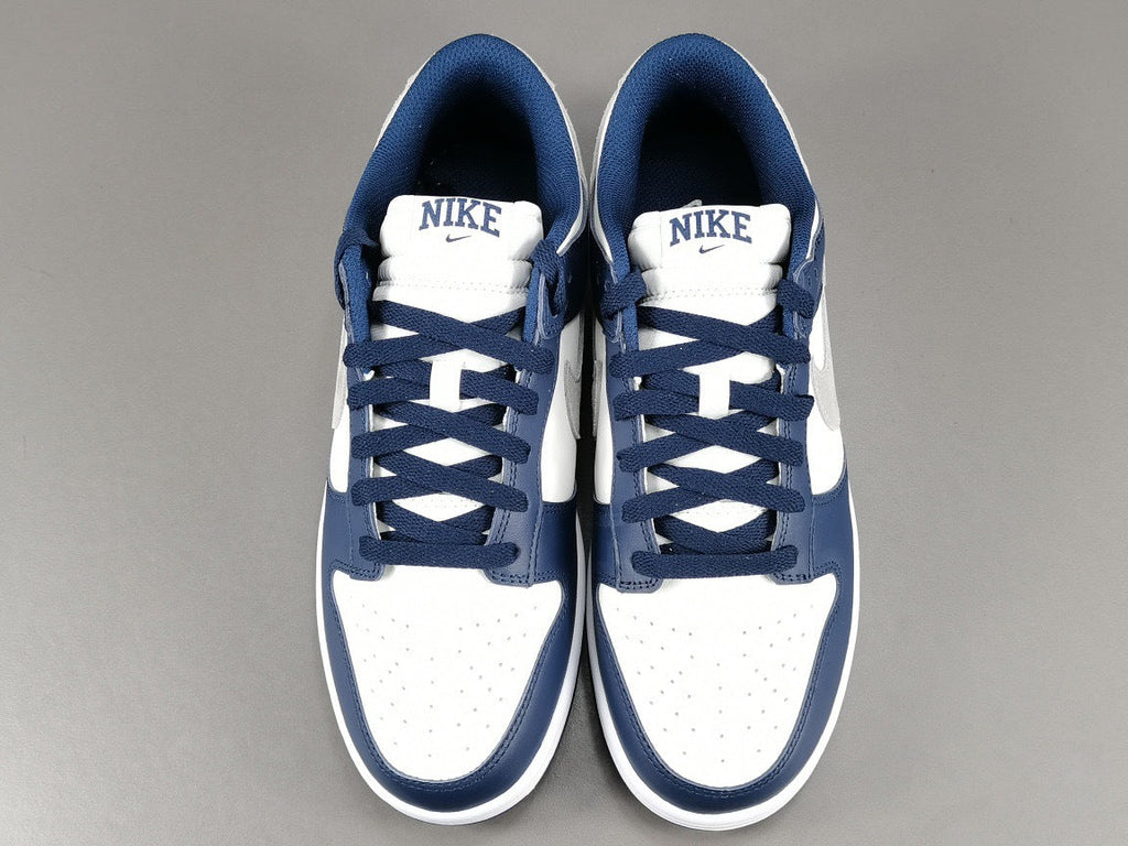 Nike Dunk Low Sneakers in Midnight Navy FD9749-400 - product image from the listing.