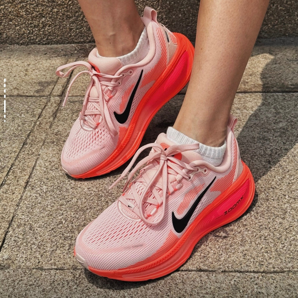 Nike Vomero 18 Running Shoes in Pink Black HM6804-600 - product image from the listing.