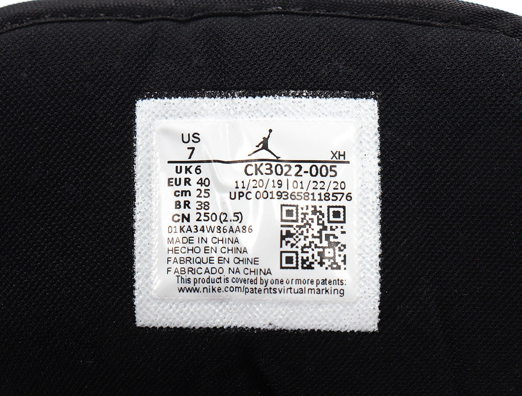 Jordan 1 Low Raspberry Sneakers in Pink Black White CK3022-005 - product image from the listing.