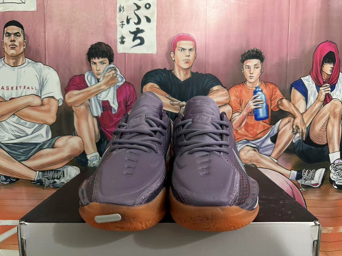 Purple and Orange Nike GT Cut 3 Basketball Shoes - product image from the listing.