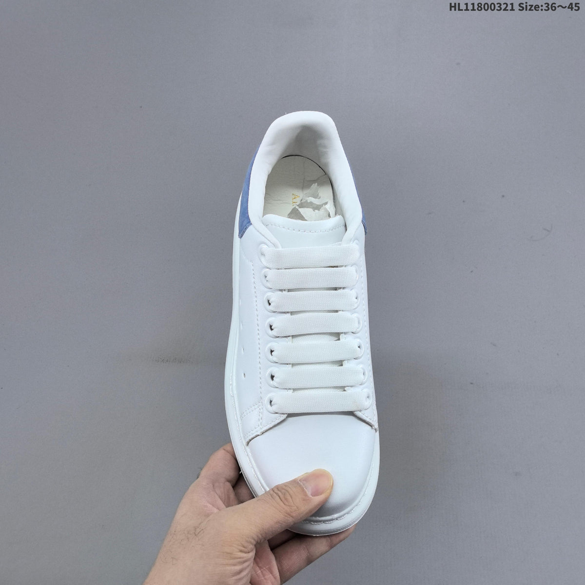 Alexander McQueen Oversized Low-Top Sneakers, in White and Blue - product image from the listing.