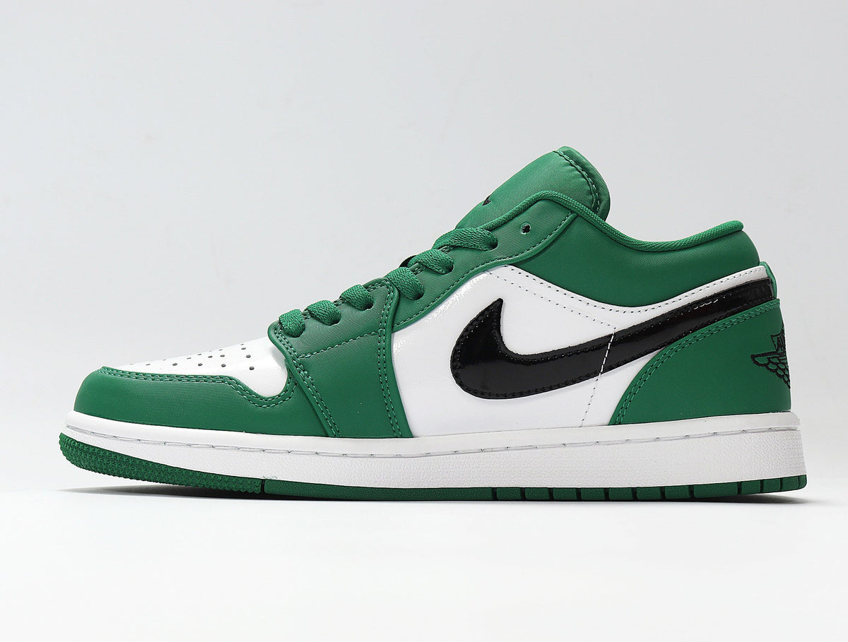 Jordan 1 Low Sneakers in White and Green 553558-301 - product image from the listing.