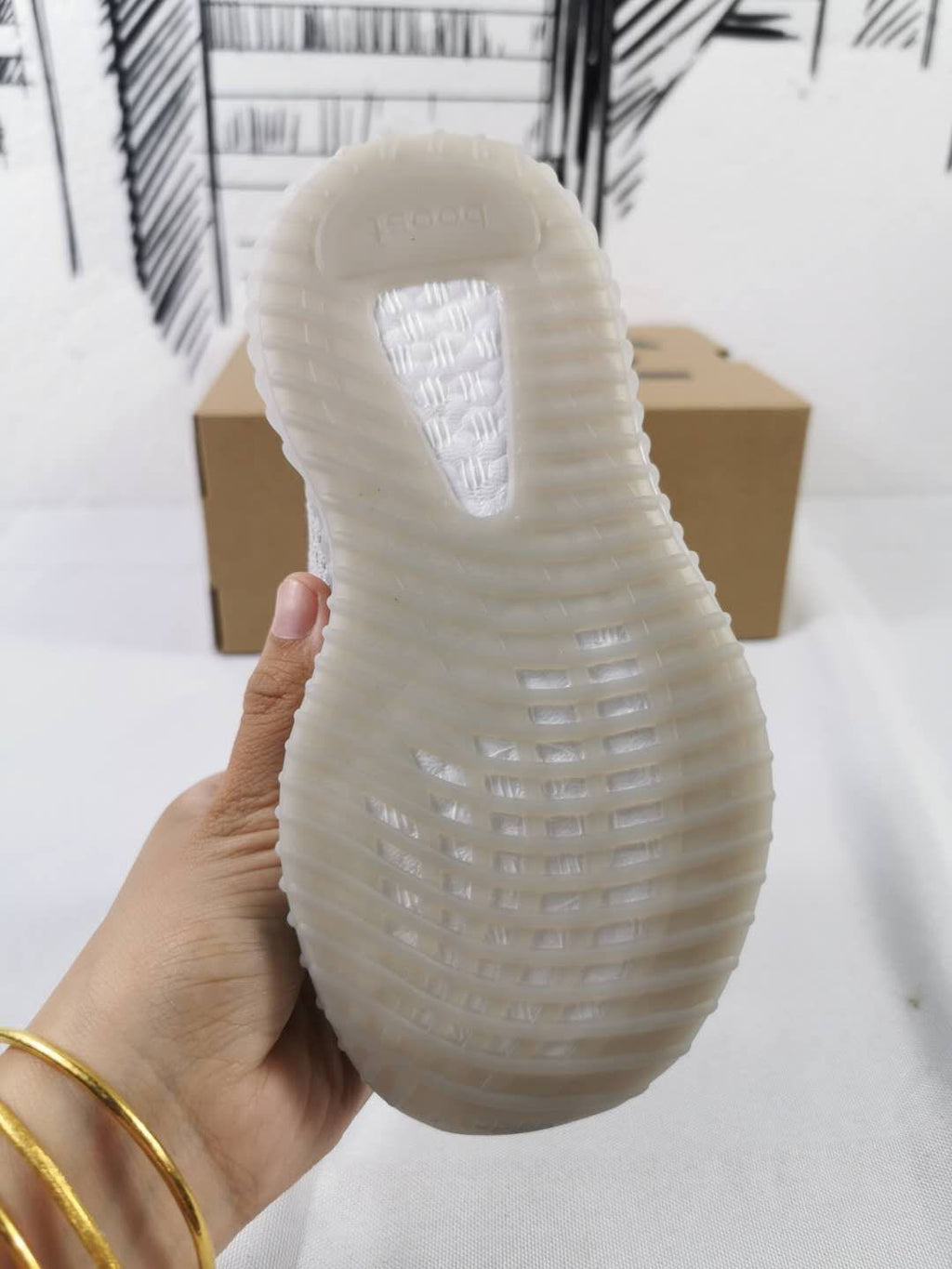 Light Grey and Coral Yeezy 350 V2 Kids Sneakers - product image from the listing.