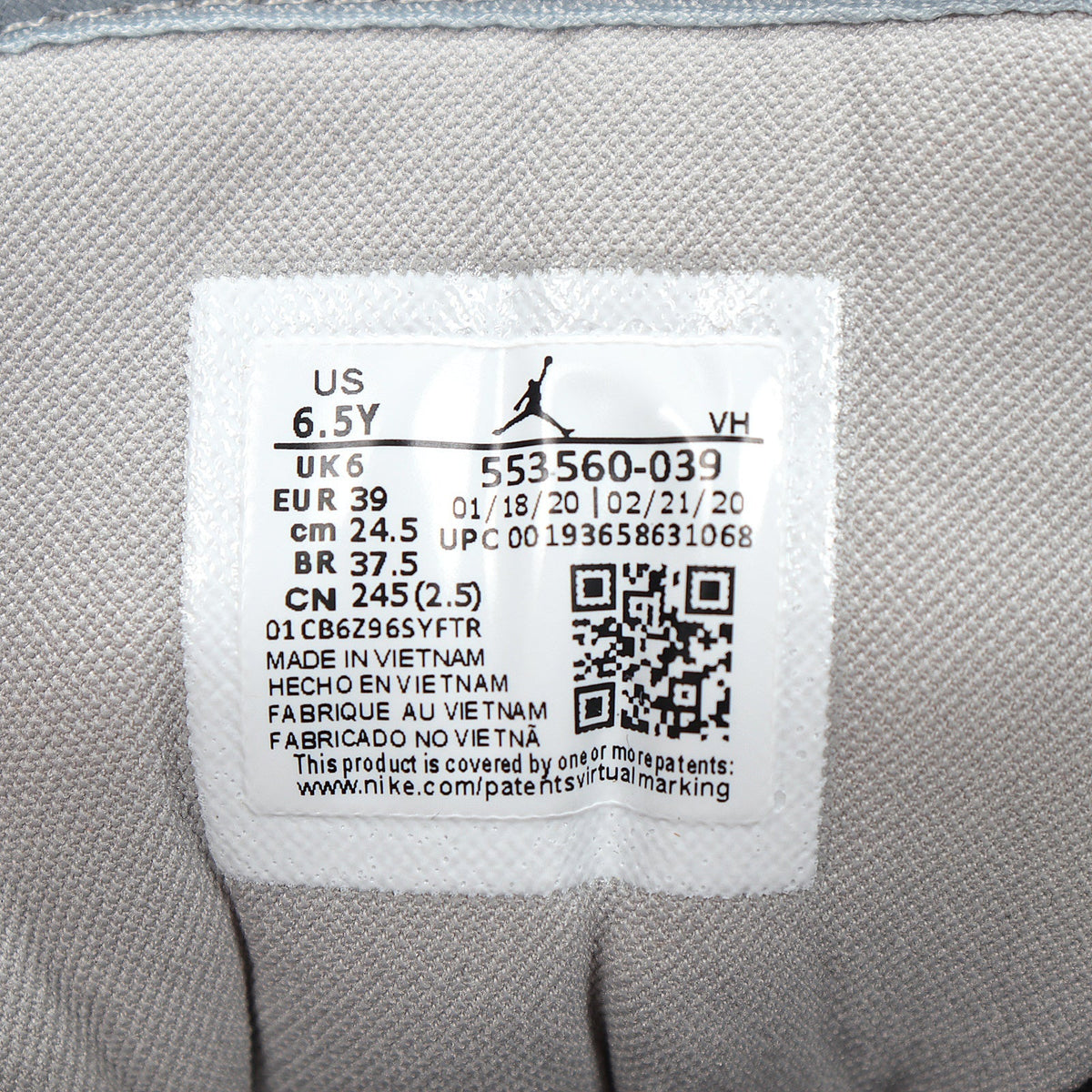 Jordan 1 Low Sneakers in Cool Grey 553560-039 - product image from the listing.