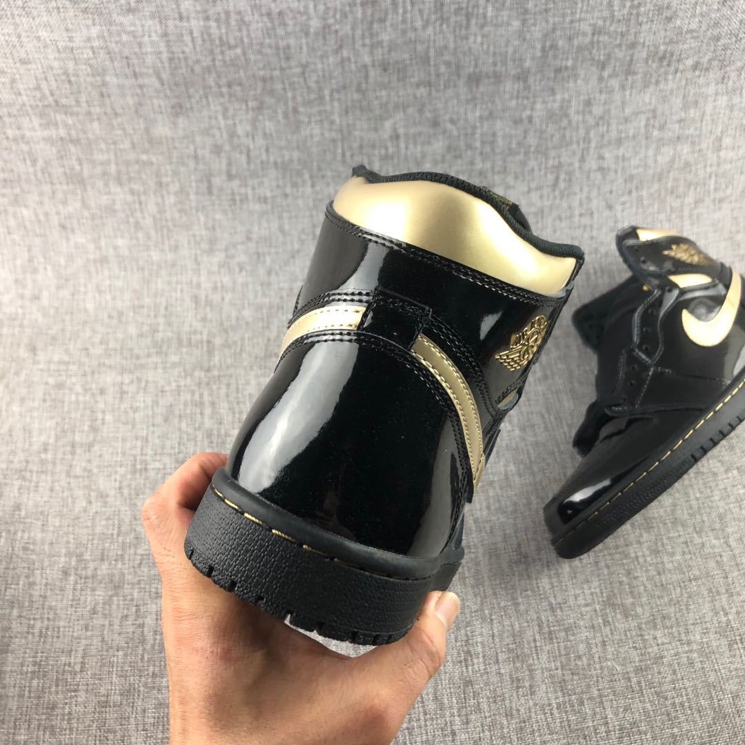Air Jordan 1 High OG Black Gold Sneakers 555088-032 - product image from the listing.