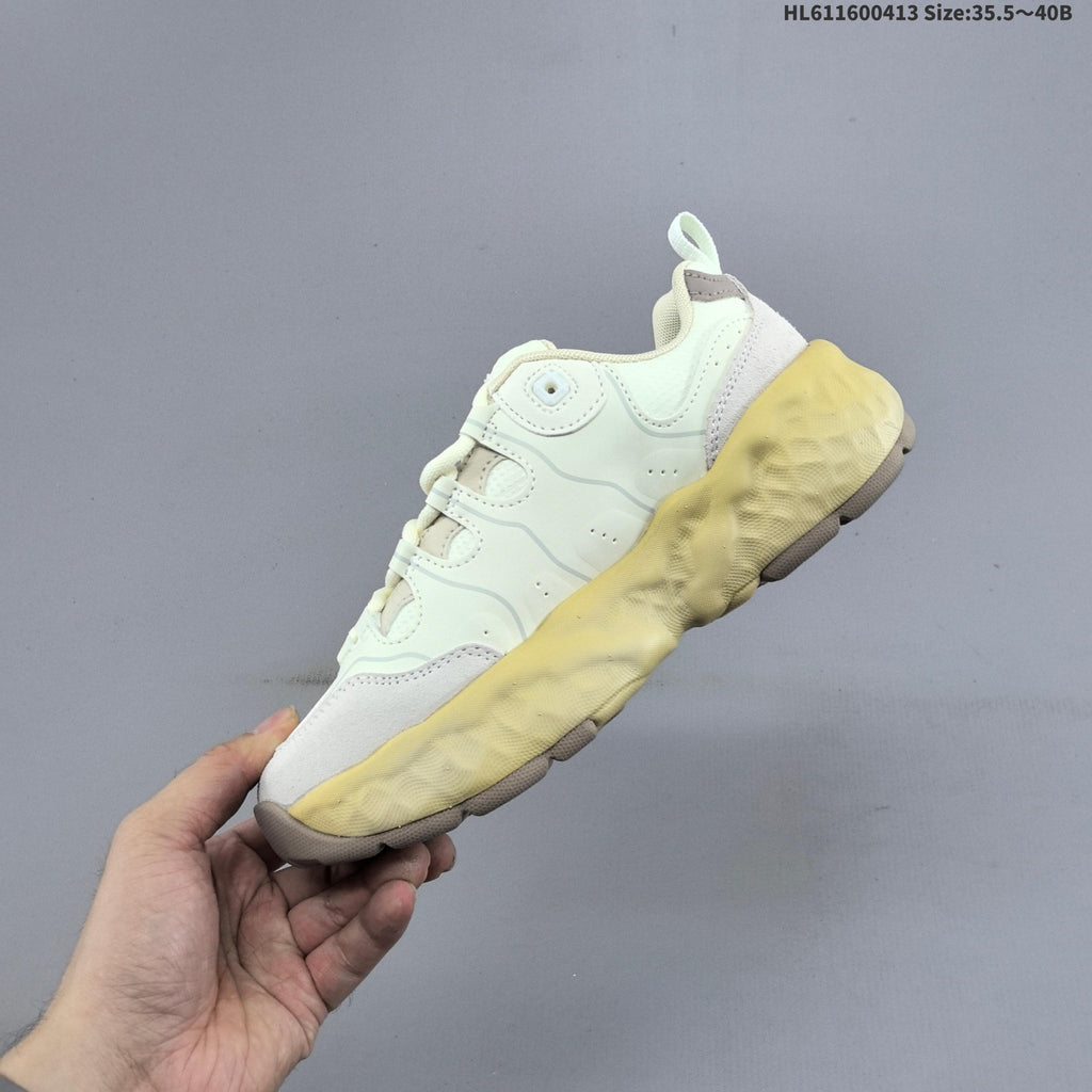 Cream and Charcoal FILA Chunky Sole Sneakers - product image from the listing.