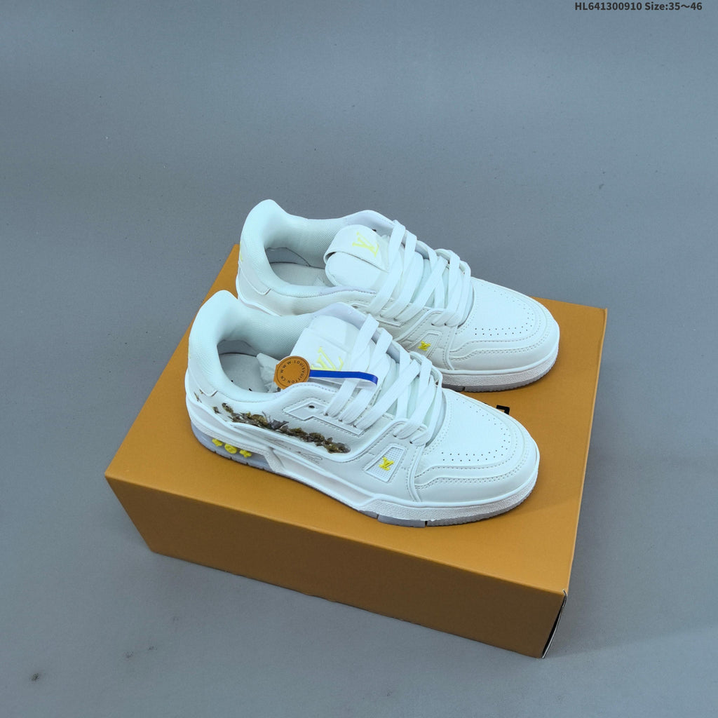 White and Black Louis Vuitton Studded Low-Top Sneakers - product image from the listing.