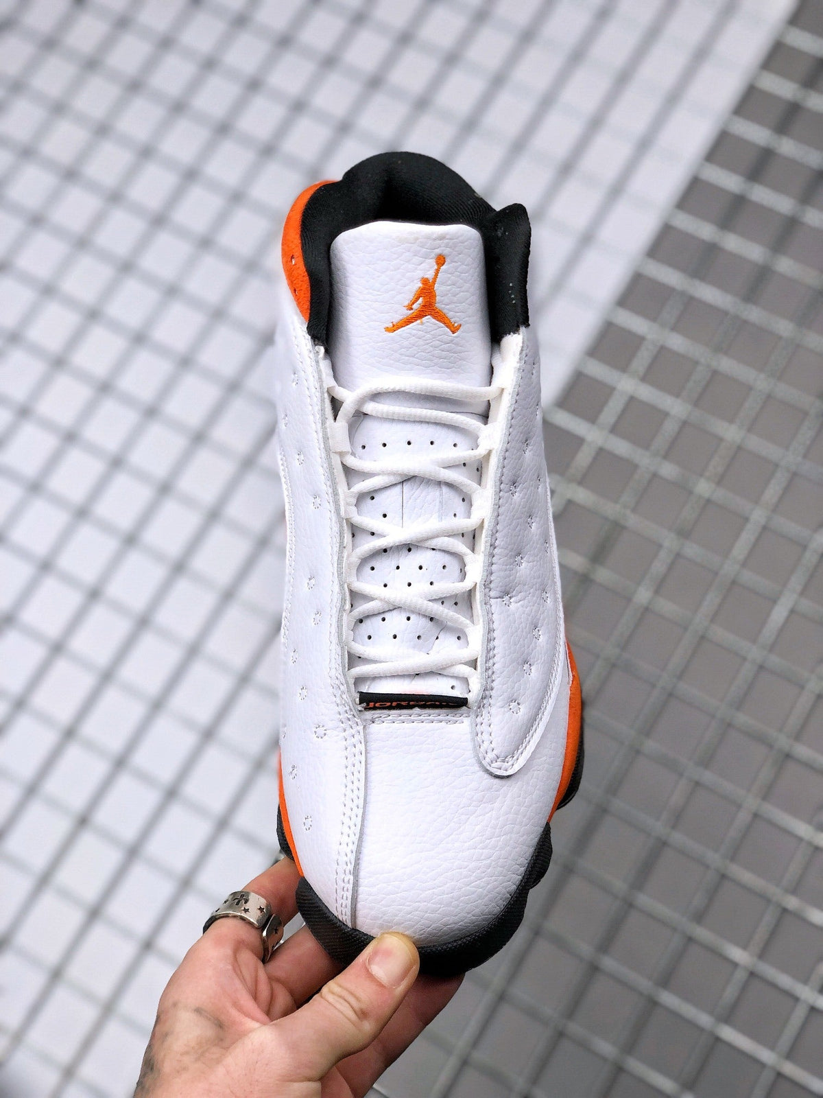 Air Jordan 13 Starfish White Orange Sneakers 414571-108 - product image from the listing.